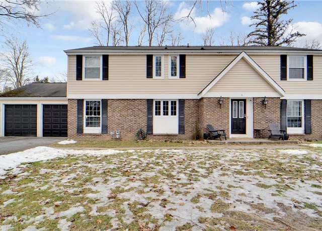 Property at 4 Harrison Cir, Pittsford, NY 14534, 7 beds, 3.5 baths