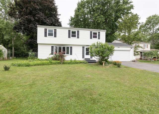 Property at 1075 Crittenden Rd, Brighton, NY 14623, 4 beds, 2 baths