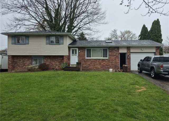 Property at 5 Glen Oaks Dr, Gates, NY 14624, 3 beds, 1.5 baths