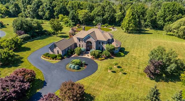 Photo of 22 Twin Ponds Dr, Parma, NY 14559
