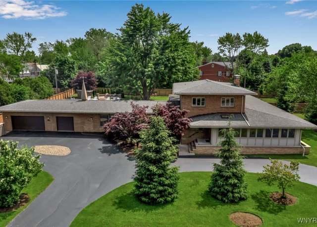 Property at 7 Lebrun Cir, Amherst, NY 14226, 4 beds, 4 baths