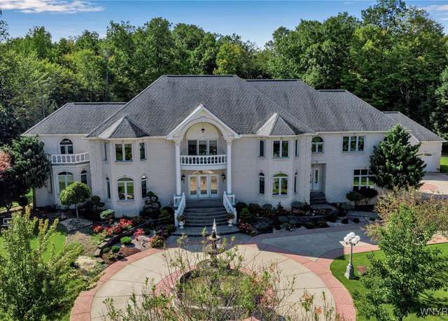 Property at 7 Woodcrest Dr, Aurora, NY 14127, 4 beds, 5.5 baths