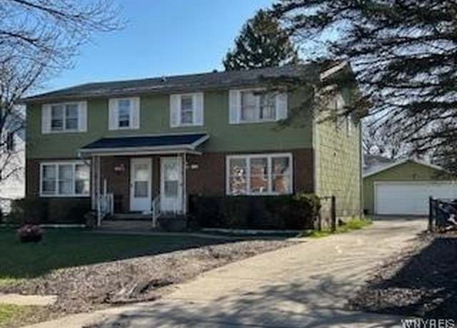Property at 124 Fairgreen Dr, Amherst, NY 14228, 6 beds, 3 baths