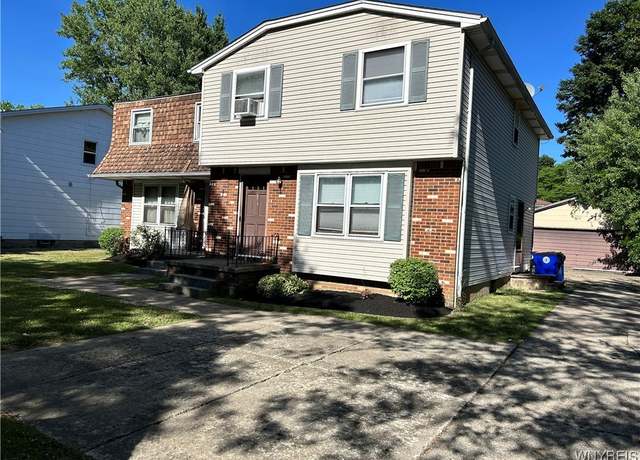 Property at 154 Fairgreen Dr, Amherst, NY 14228, 6 beds, 3 baths