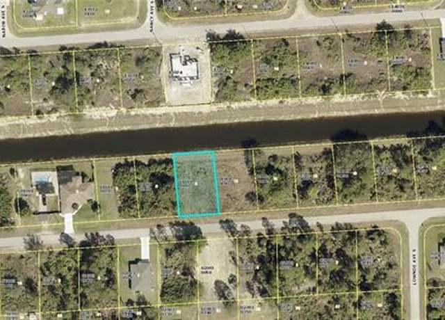 Property at 1123 Cherry St E, Lehigh Acres, FL 33974