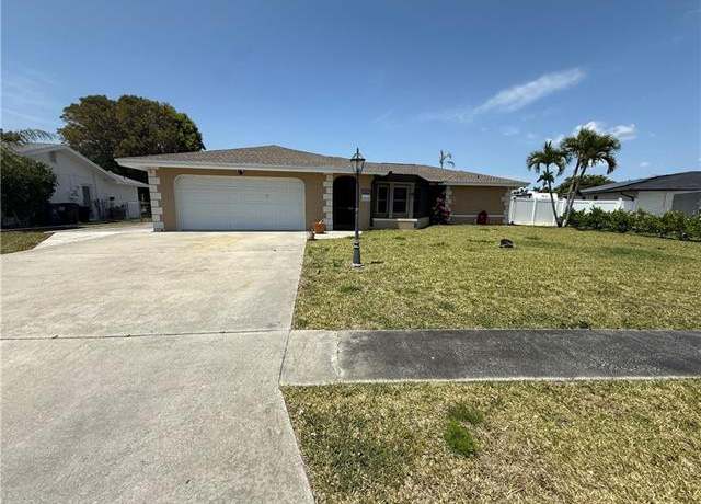 Property at 1427 Carmelle Dr, Fort Myers, FL 33919, 4 beds, 2 baths