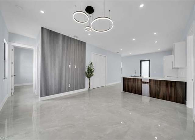 Property at 939 Commodore St, Lehigh Acres, FL 33974, 4 beds, 3 baths