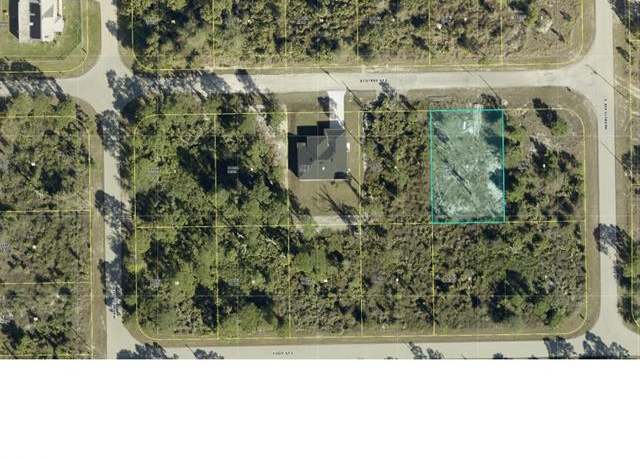 Property at 1222 Ecstasy St E, Lehigh Acres, FL 33974