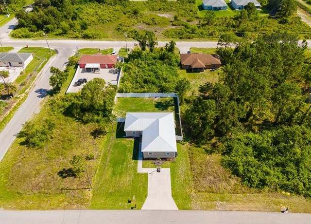 Property at 2916 9th St SW, Lehigh Acres, FL 33976, 4 beds, 2 baths