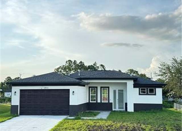 Property at 2507 30th St SW, Lehigh Acres, FL 33976, 3 beds, 2 baths