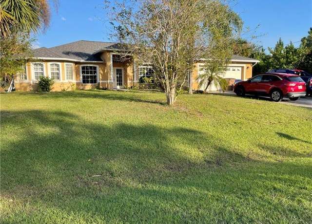 Property at 710 Desoto Ave, Lehigh Acres, FL 33972, 4 beds, 4.5 baths