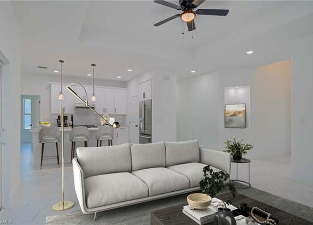 Property at 425 Naples Ave S, Lehigh Acres, FL 33974, 4 beds, 3 baths