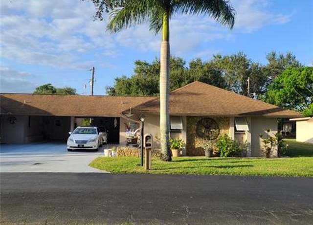 Property at 215 Oaklawn Ct, Lehigh Acres, FL 33936, 2 beds, 2 baths