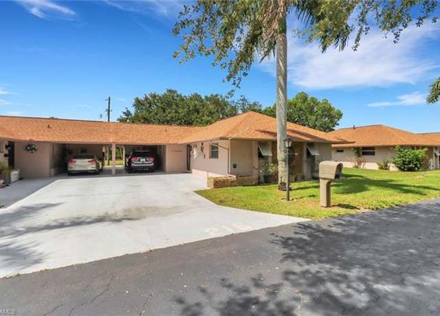 Property at 215 Oaklawn Ct, Lehigh Acres, FL 33936, 2 beds, 2 baths