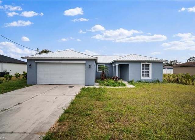 Property at 519 Upstate Ave S, Lehigh Acres, FL 33974, 4 beds, 2 baths