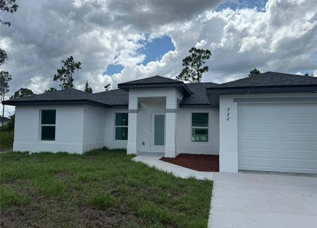 Property at 322 Mcarthur Blvd, Lehigh Acres, FL 33974, 3 beds, 2 baths