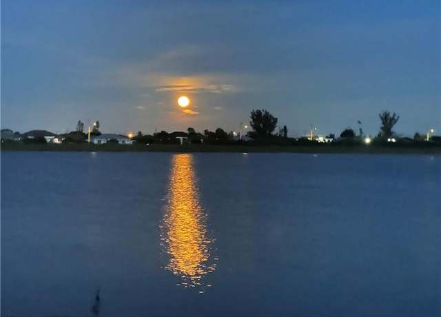 Property at 663 Parkshore Lake Ave, Cape Coral, FL 33993, 3 beds, 2.5 baths