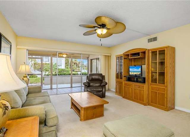 Property at 215 Cypress Way E Unit B2, Naples, FL 34110, 2 beds, 2 baths