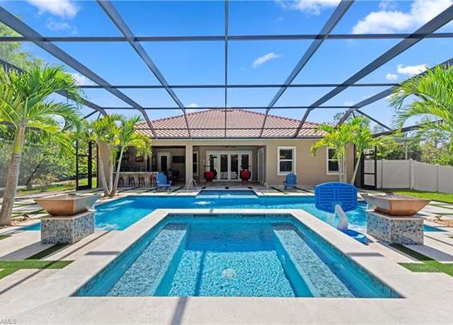 Property at 915 16th St SE, Naples, FL 34117, 4 beds, 4 baths
