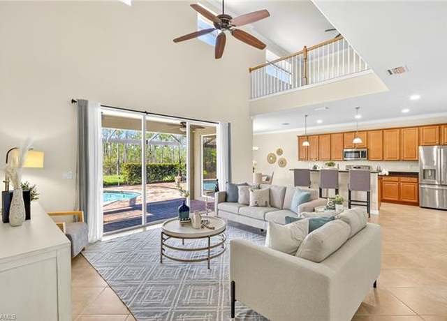 Property at 21412 Bella Terra Blvd, Estero, FL 33928, 5 beds, 4.5 baths