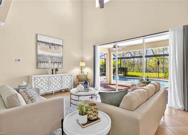 Property at 21412 Bella Terra Blvd, Estero, FL 33928, 5 beds, 4.5 baths