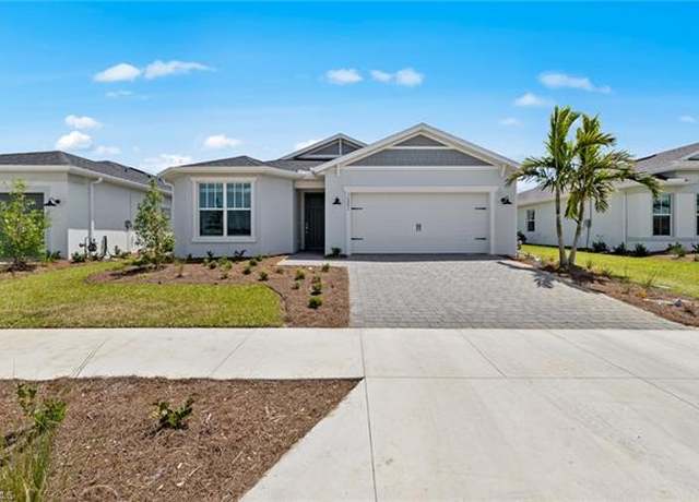 Property at 604 Oasis Lake Pl, Lehigh Acres, FL 33936, 4 beds, 2 baths