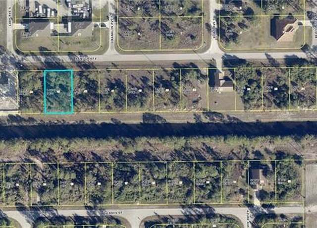 Property at 1032 Kanuga St E, Lehigh Acres, FL 33974