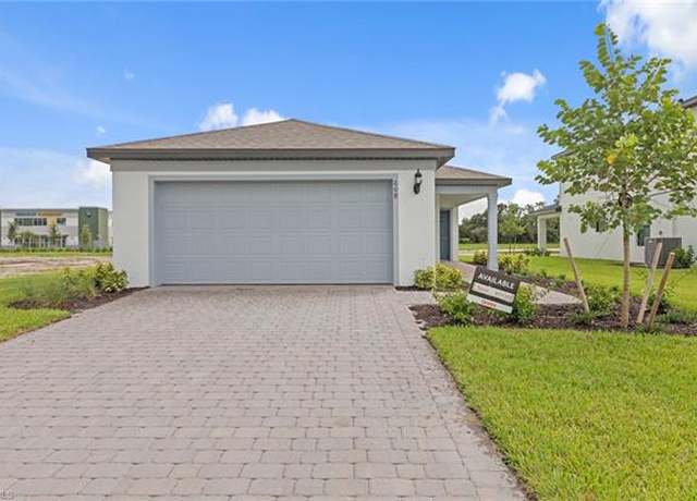 Property at 619 Lakeside Oasis Ave, Lehigh Acres, FL 33936, 4 beds, 2 baths
