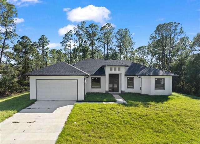 Property at 1305 W 17th St, Lehigh Acres, FL 33972, 4 beds, 3 baths