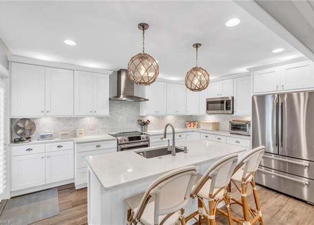 Property at 97 1st St, Bonita Springs, FL 34134, 3 beds, 3 baths