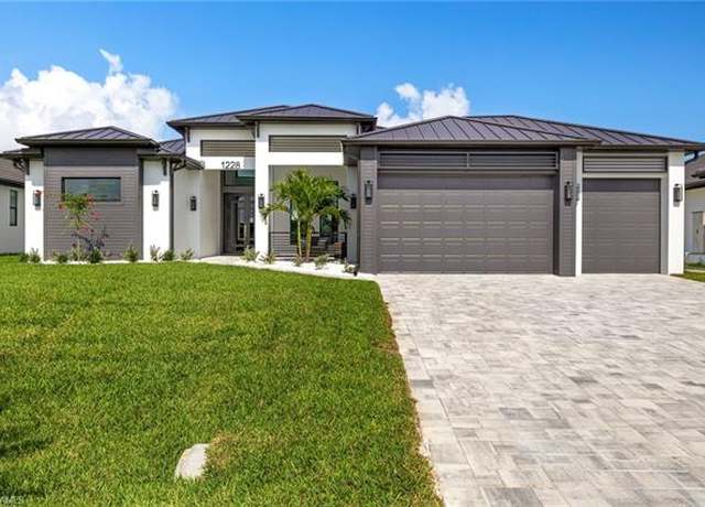 Property at 1228 NW 40th Pl, Cape Coral, FL 33993, 3 beds, 3 baths