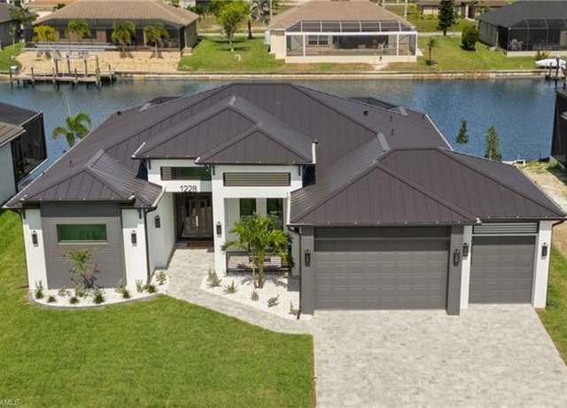 Property at 1228 NW 40th Pl, Cape Coral, FL 33993, 3 beds, 3 baths