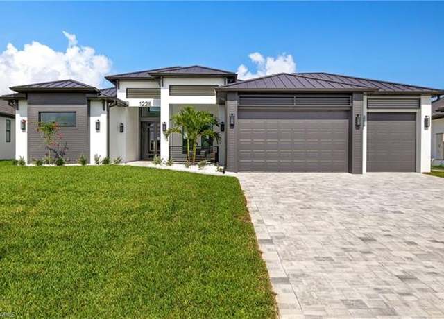 Property at 1228 NW 40th Pl, Cape Coral, FL 33993, 3 beds, 3 baths