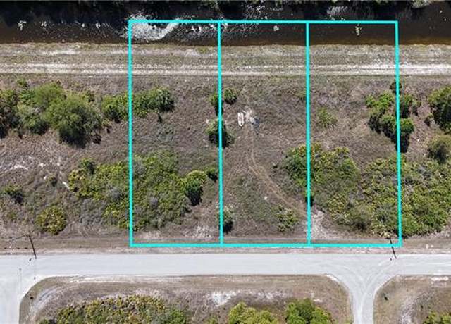 Property at 1008 Kanuga St E, Lehigh Acres, FL 33974