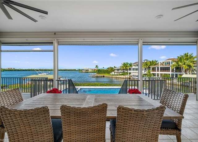 Property at 235 Dolphin Cove Ct, Bonita Springs, FL 34134, 3 beds, 4 baths