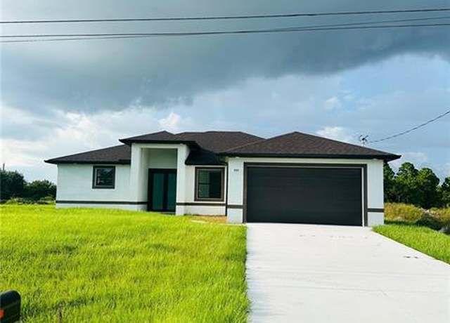 Property at 545 Trinity St E, Lehigh Acres, FL 33974, 4 beds, 2 baths
