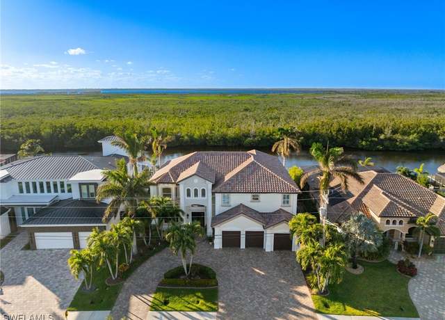 Property at 3820 Surfside Blvd, Cape Coral, FL 33914, 4 beds, 5 baths