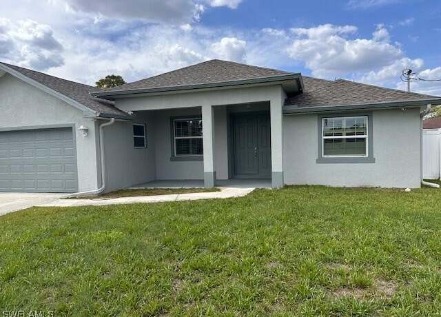 Property at 5220 Billings St, Lehigh Acres, FL 33971, 4 beds, 2 baths