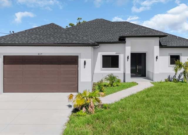Property at 817 Jacaranda Pkwy E, Cape Coral, FL 33909, 4 beds, 2.5 baths
