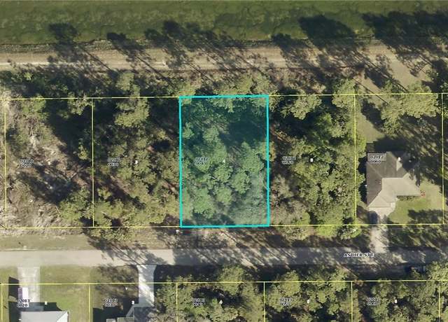 Property at 1009 Asther St E, Lehigh Acres, FL 33974