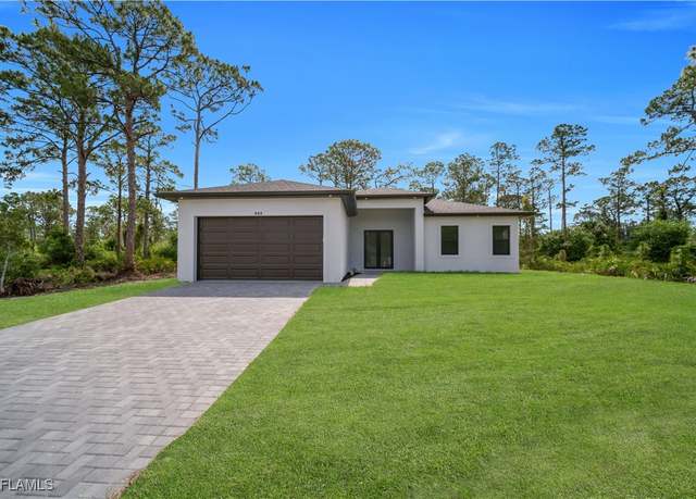 Property at 920 Palmetto Ave E, Lehigh Acres, FL 33972, 4 beds, 2 baths