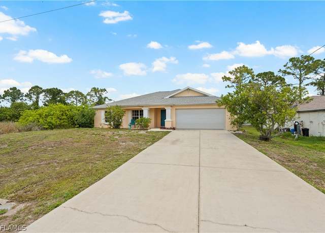 Property at 277 Grant Blvd, Lehigh Acres, FL 33974, 3 beds, 2 baths