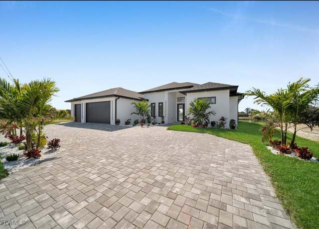 Property at 414 Nicholas Pkwy E, Cape Coral, FL 33990, 4 beds, 3 baths