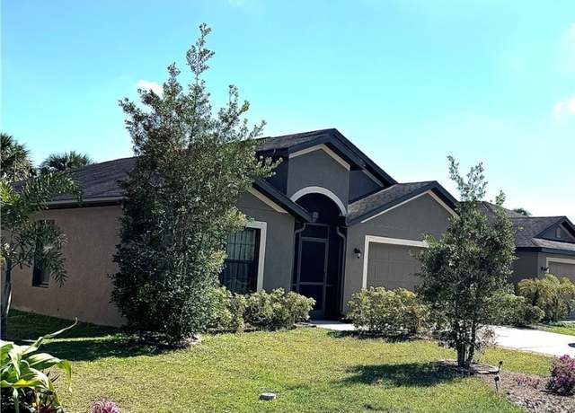 Property at 233 Shadow Lakes Dr, Lehigh Acres, FL 33974, 4 beds, 2 baths