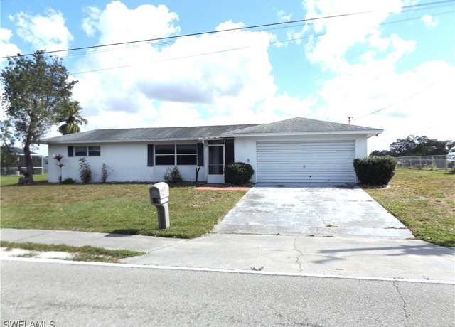 Property at 14 Richmond Ave N, Lehigh Acres, FL 33936, 4 beds, 2 baths