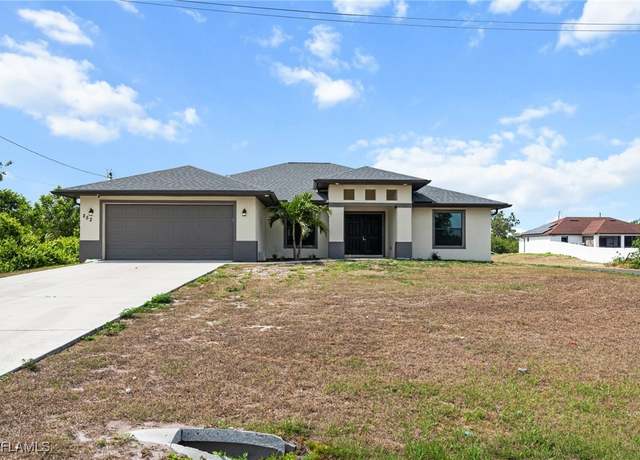 Property at 2521 14th St SW, Lehigh Acres, FL 33976, 4 beds, 2 baths