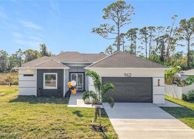 Property at 962 Iris St E, Lehigh Acres, FL 33974, 4 beds, 3 baths