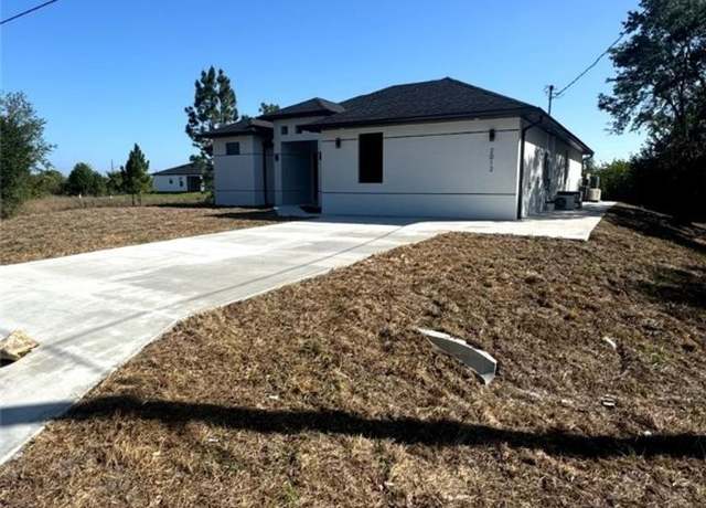 Property at 2012 Venice Ave N, Lehigh Acres, FL 33971, 5 beds, 4 baths