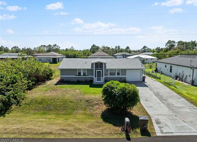 Property at 2613 12th St SW, Lehigh Acres, FL 33976, 3 beds, 2 baths
