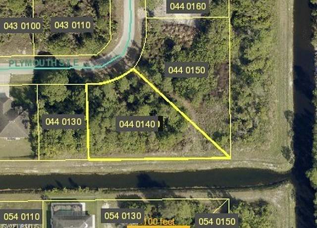 Property at 1046 Plymouth St E, Lehigh Acres, FL 33974